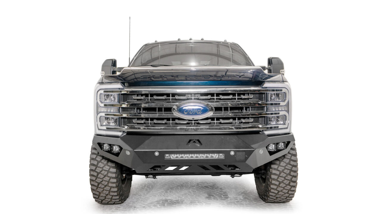Enhance Your 2023 Ford Super Duty with Fab Fours Vengeance Series Front Bumper - Built for Style and Durability. Winch Mount, D-Ring Mounts, and Fog Light Integration. Shop Now for Premium Truck Upgrades