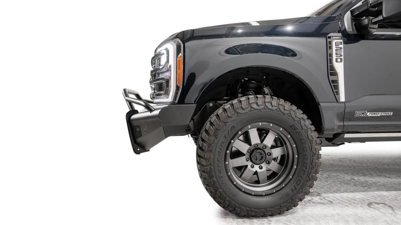 Fab Fours Black Steel ELITE front bumper – The ultimate combination of style and strength. Enhance the look and performance of your vehicle with our top-of-the-line Black Steel ELITE front bumper. Engineered for rugged off-road adventures and designed to withstand the toughest challenges. Explore the features, finishes, and custom options available. Shop now for the best in front-end protection and aggressive styling from Fab Fours.